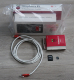 Picture of Raspberry Pi with Touch Display etc. in their boxes